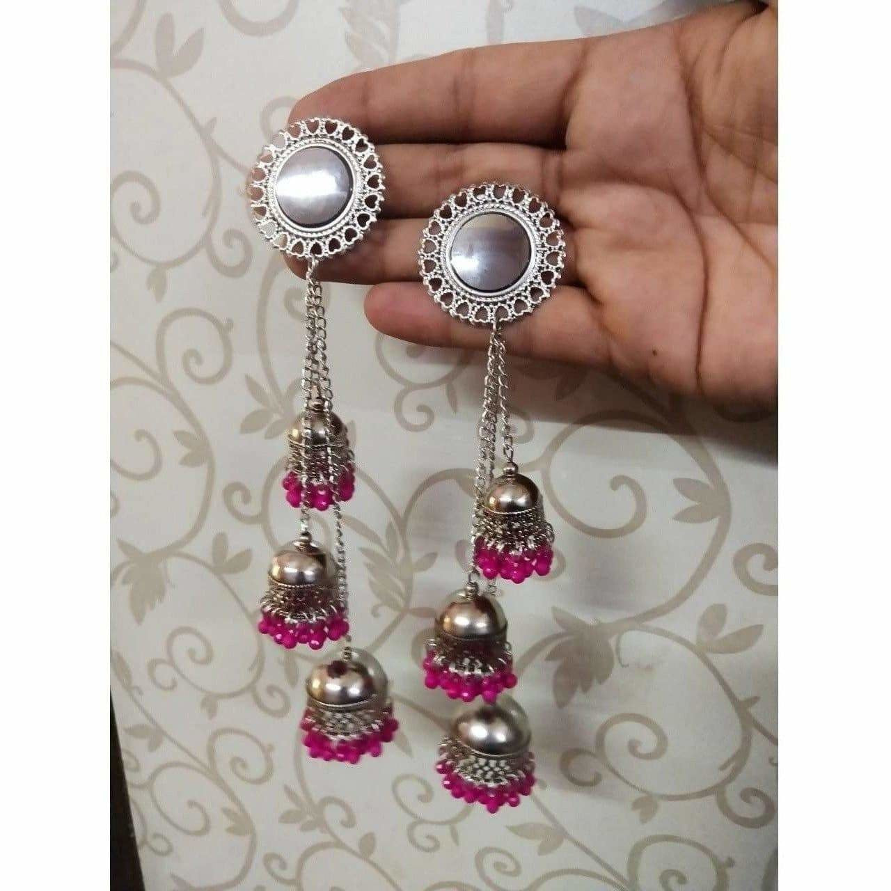 Latest designer pink jhumka earrings for women in a traditional ethnic style