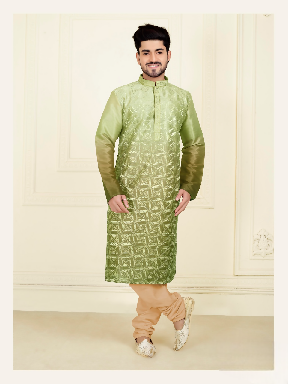 Close up of green slub silk kurta with embroidery for toddler boys