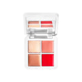 A mini makeup quad palette featuring four creamy balm shades of champagne, nude, pink, and red for lips and cheeks.