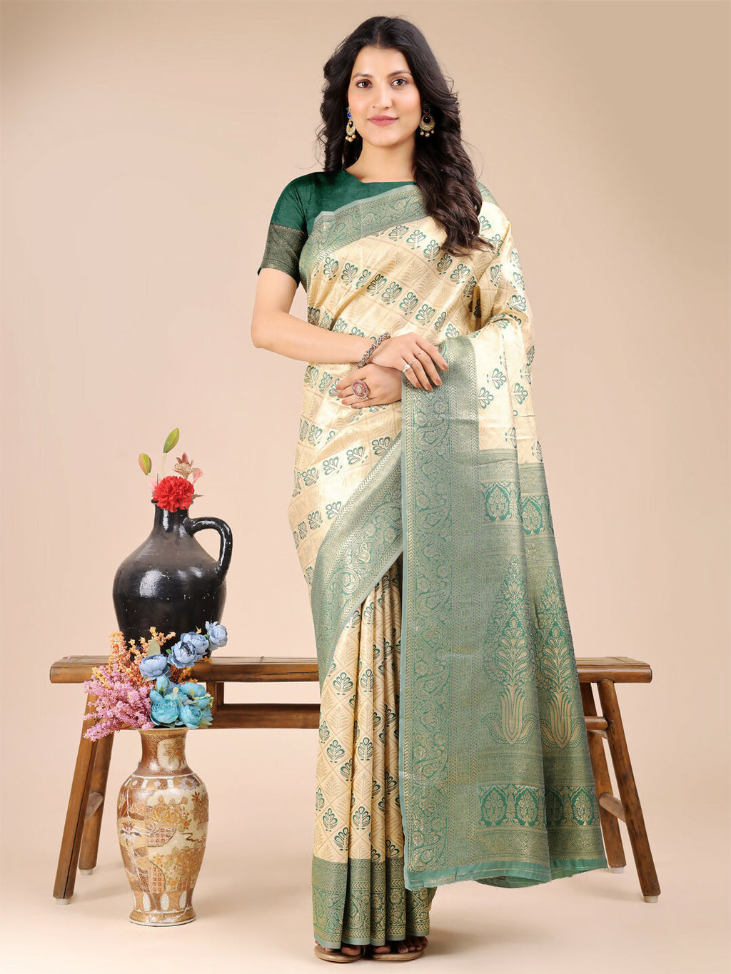 Cream and green Banarasi silk saree with matching blouse piece
