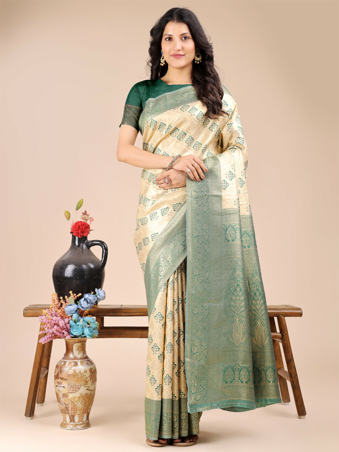 Cream and green Banarasi silk saree with matching blouse piece