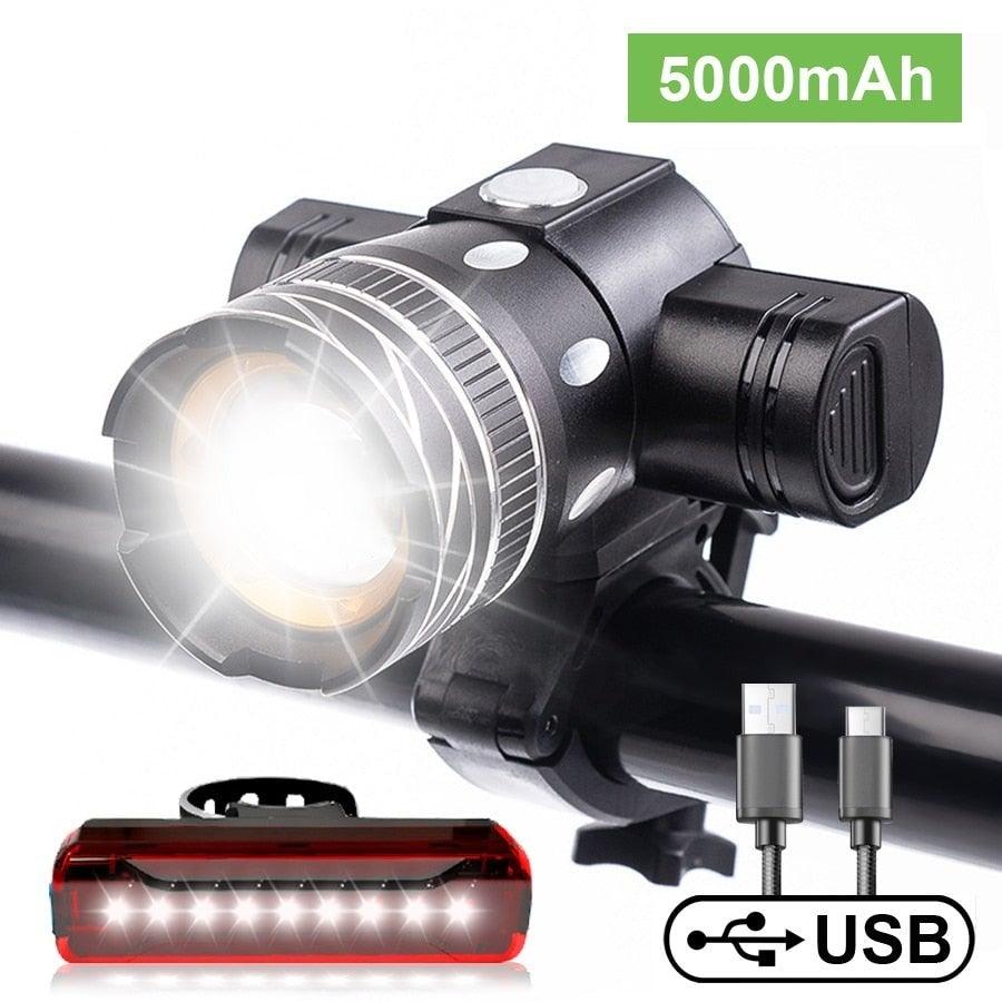 Matte black 800-lumen LED bicycle headlight with silver accent ring mounted on handlebars.