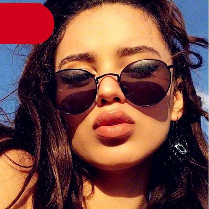 Round and oval retro metal sunglasses in silver, black, and pink
