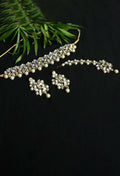 Gold-polished brass choker with Kundan stones and white pearls