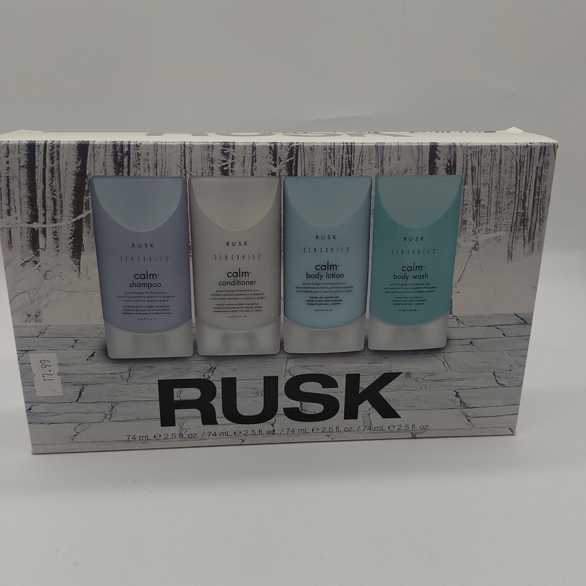 Rusk Calm Guarana and Ginger Nourishing Leave-In Spray bottle with white, blue, and teal design.