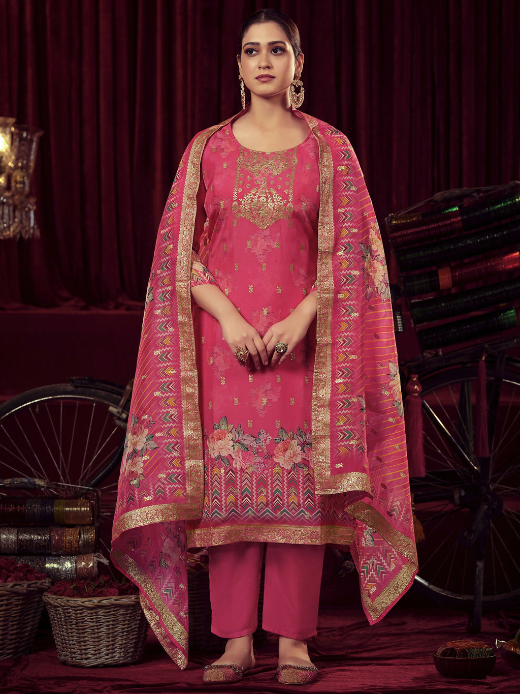 Magenta organza jacquard woven straight kurta set with muslin pants and matching dupatta.