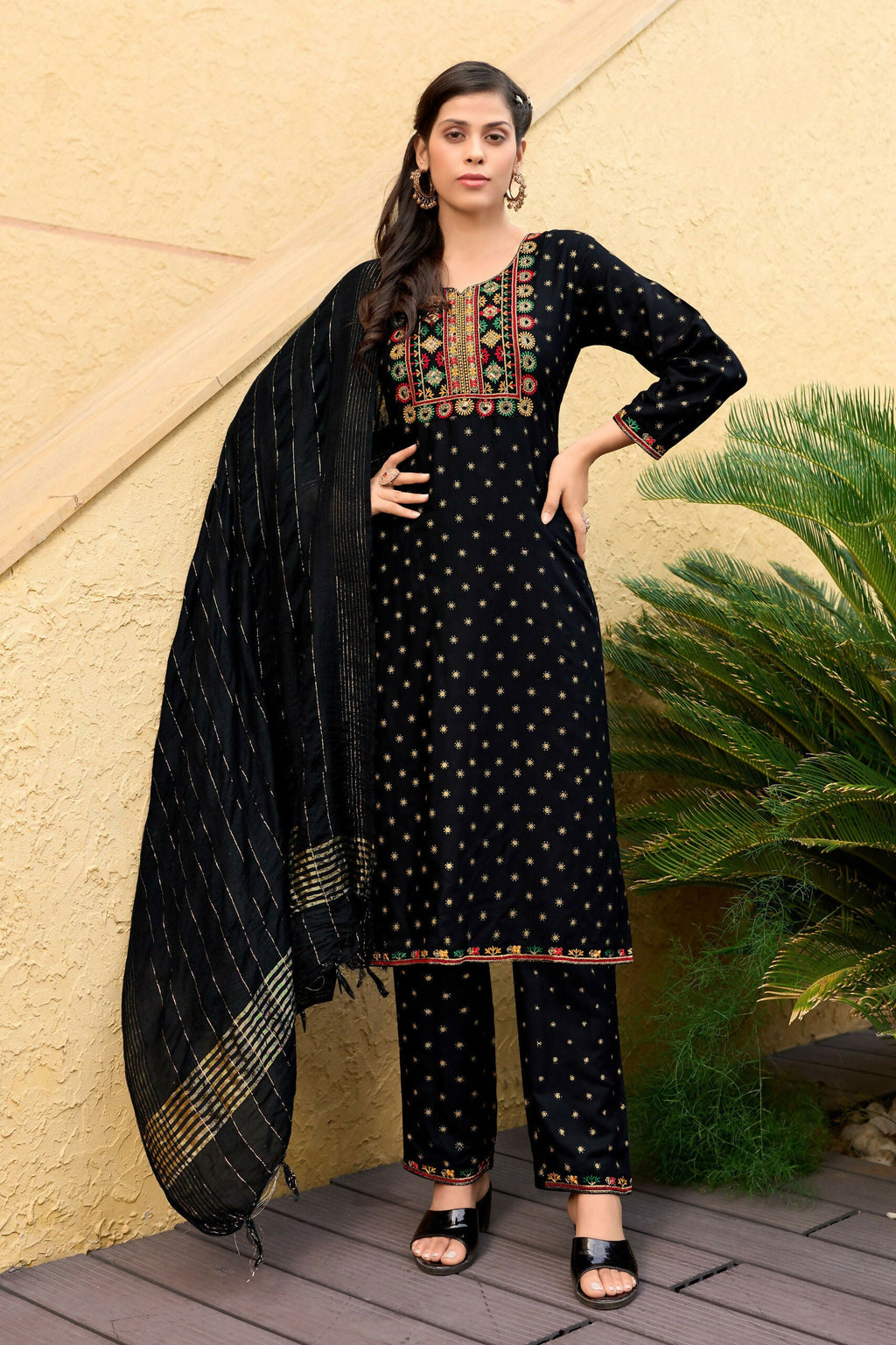 Black 14KG rayon knee-length kurta featuring decorative foil print and detailed embroidery