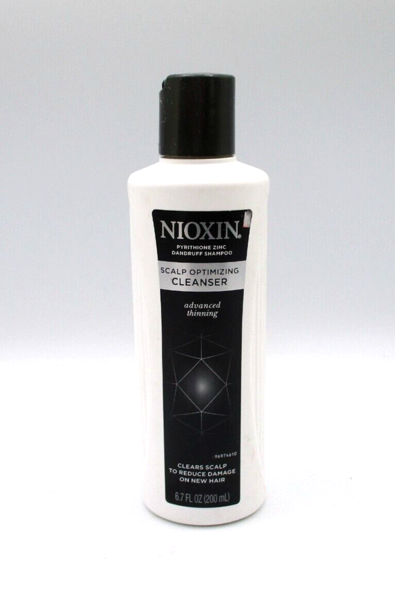 Nioxin Scalp Optimizing Cleanser bottle used for purifying the scalp and promoting healthy hair growth.