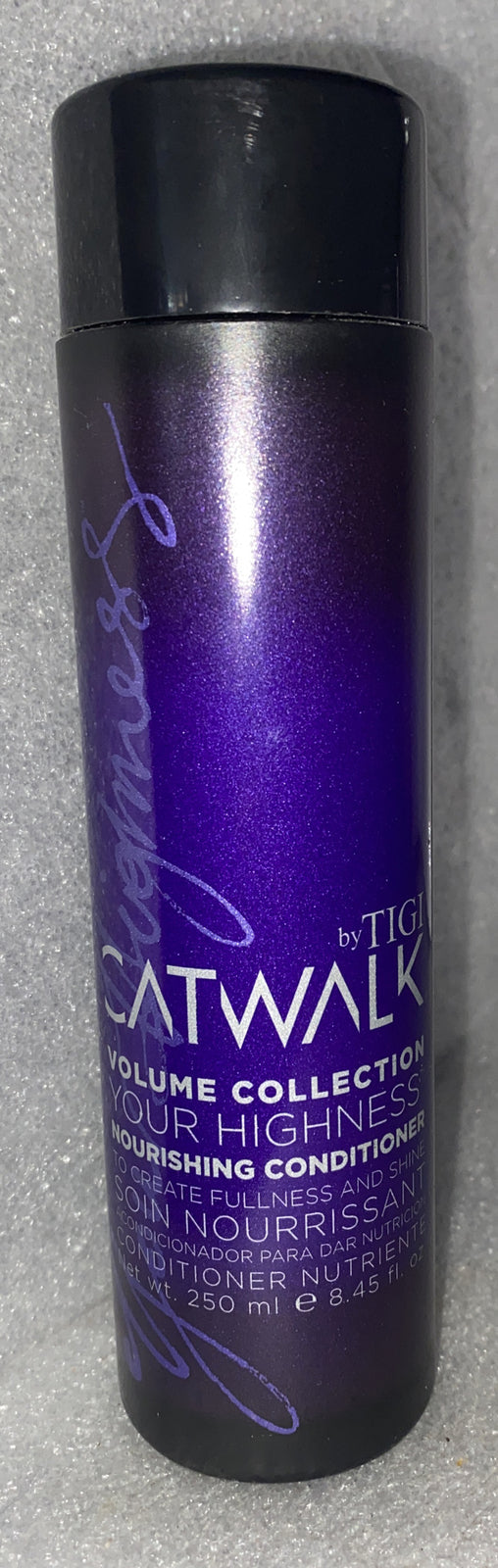 TIGI Catwalk Your Highness Nourishing Conditioner in a purple and black bottle.