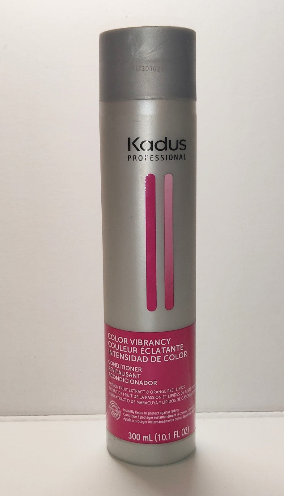 A 10.1 oz bottle of Kadus Professional Color Vibrancy Conditioner for color-treated hair.
