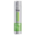 Bottle of Kadus Professional Impressive Volume Conditioner in silver and green packaging
