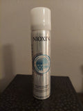 Travel size Nioxin Instant Fullness Dry Cleanser 1.52 oz bottle