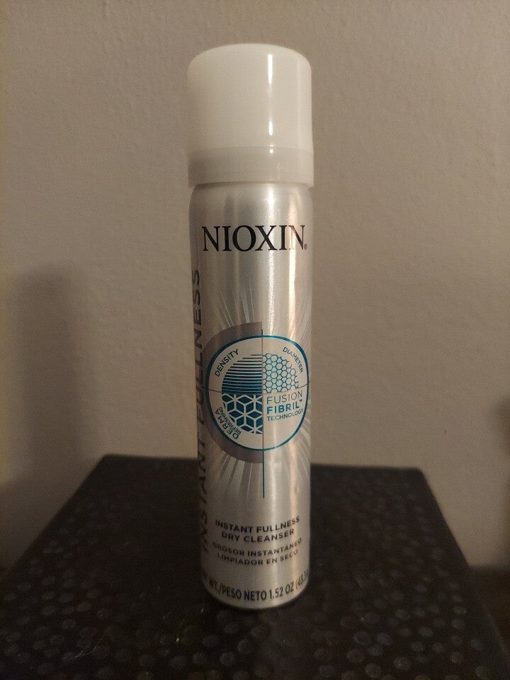 Travel size Nioxin Instant Fullness Dry Cleanser 1.52 oz bottle