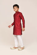 Rich maroon silk kurta with intricate thread work and white straight-fit pants