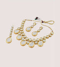 Handcrafted golden and white Kundan necklace set with adjustable cord