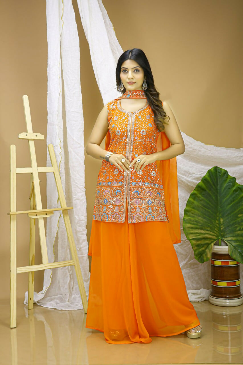 Vibrant orange embroidered georgette sharara set for festive occasions.
