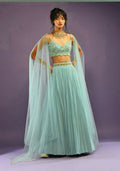 Turquoise Faux Georgette lehenga choli with crush work and sequins