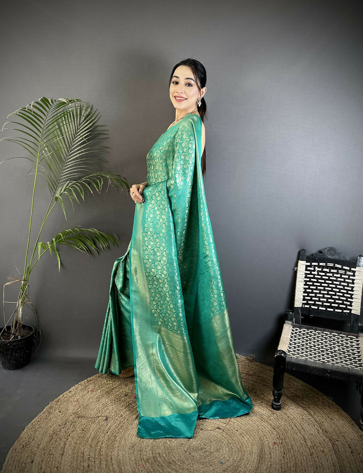 Rama Green Soft Satin Silk Banarasi Saree with Paisley Motifs