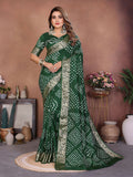 Green pure Dola silk saree with traditional handmade Bandhej patterns