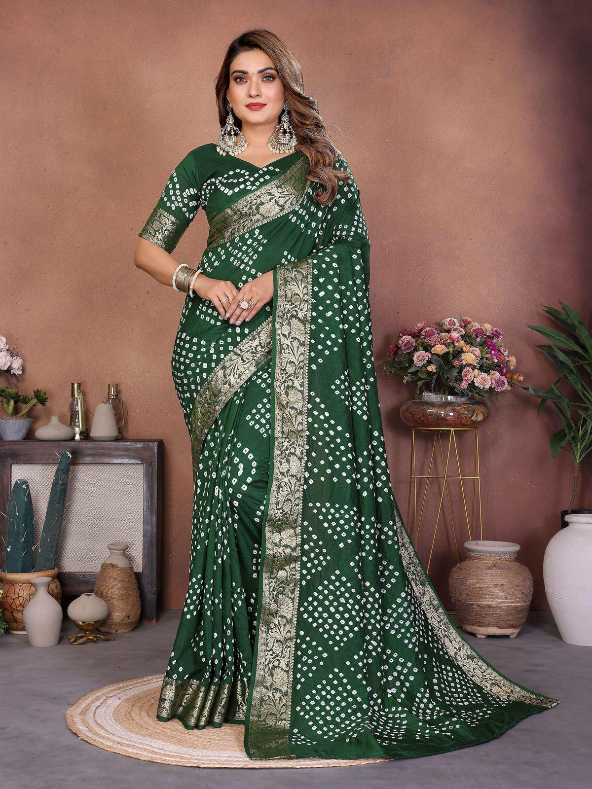 Green pure Dola silk saree with traditional handmade Bandhej patterns