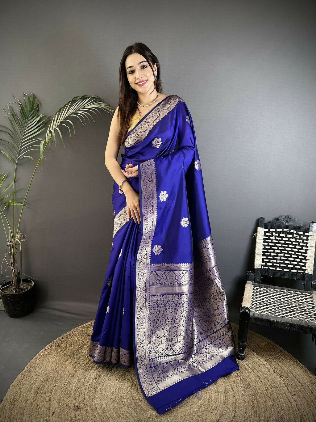 Royal blue cotton silk Banarasi saree with intricate floral jacquard weaving and matching blouse.