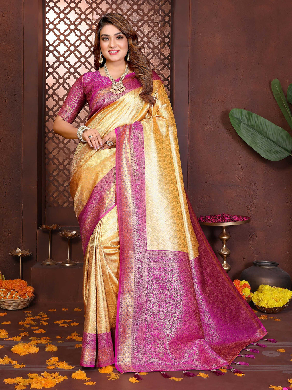 Elegant cream tissue silk saree with woven details and a contrasting magenta blouse