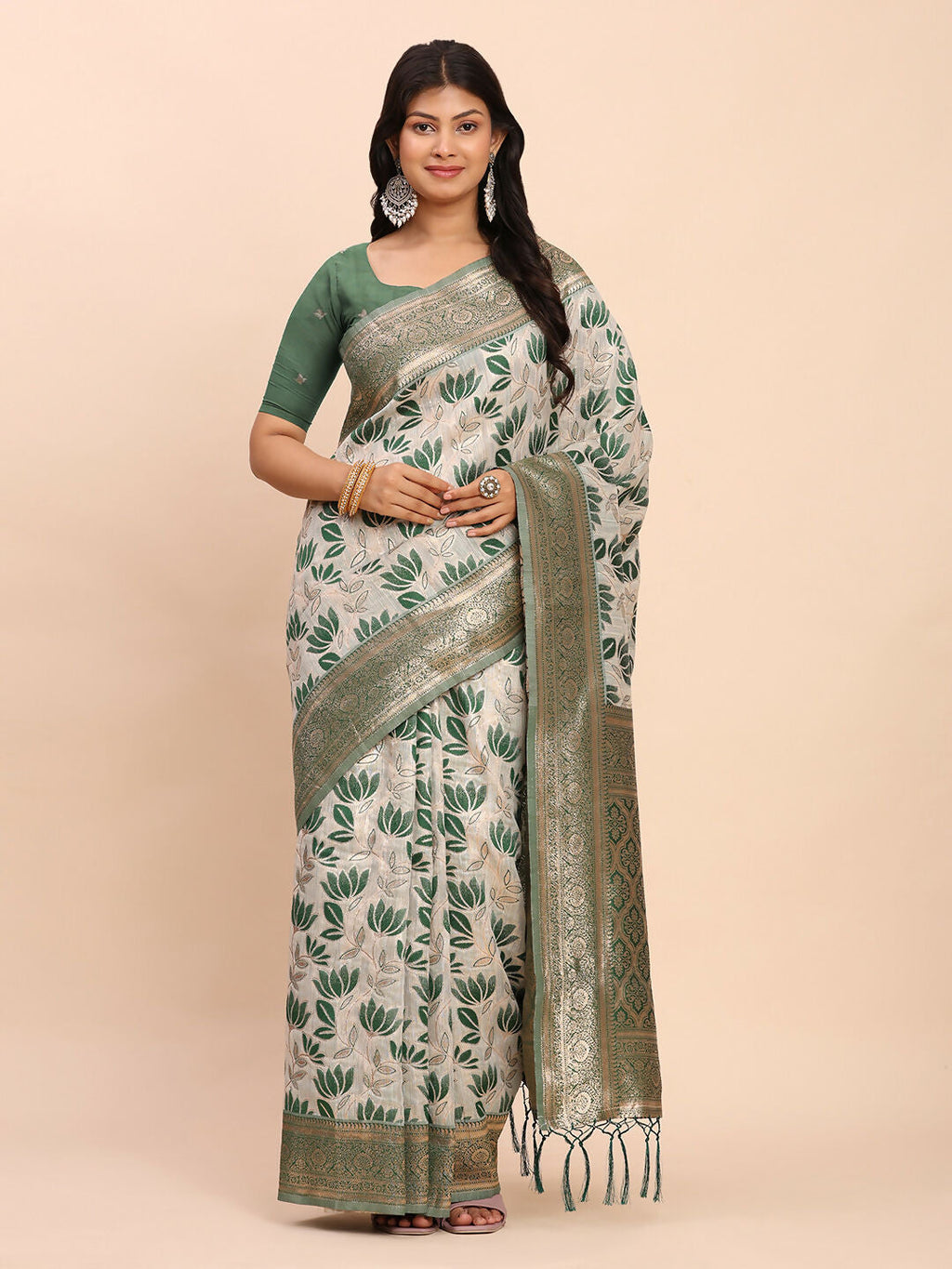 Elegant green linen cotton saree with a matching green blouse piece.