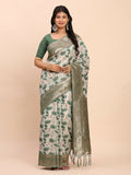 Elegant green linen cotton saree with a matching green blouse piece.