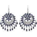 A pair of silver oxidized alloy Chandbali earrings with black beads and stone embellishments.