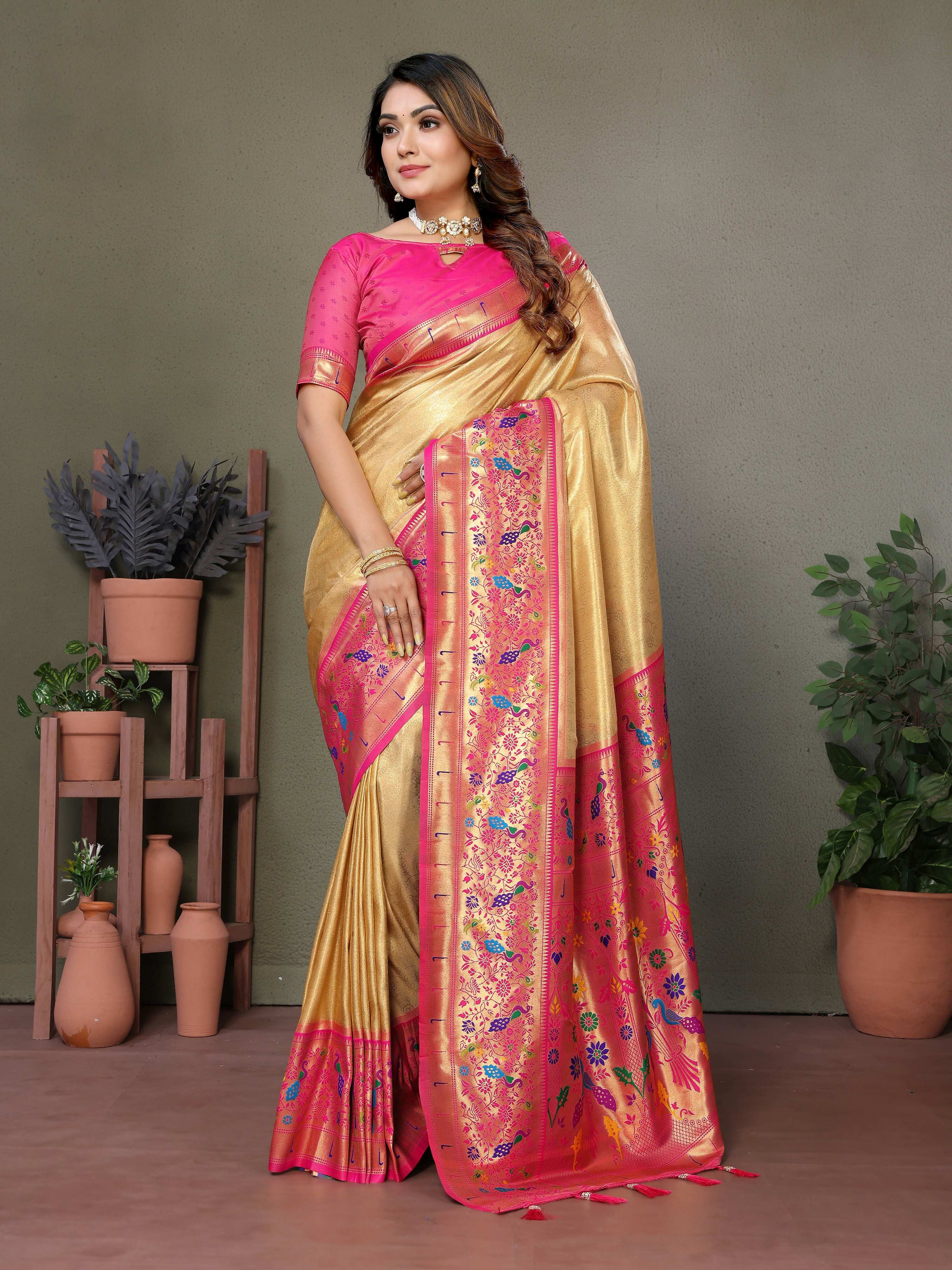 Gold tissue silk saree with traditional Paithani woven work.
