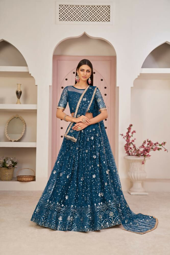 Peach butterfly net lehenga choli with intricate zari and sandwich sequence thread work embroidery