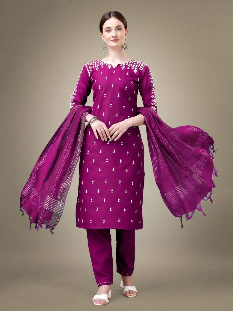 Women's purple cotton blend straight kurta with embroidery and sequence work paired with matching trousers and dupatta.