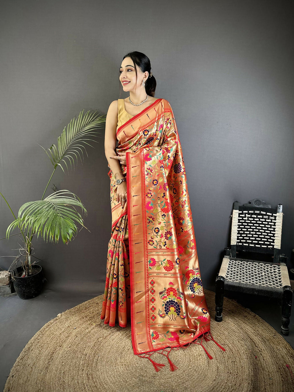 Crimson Red soft silk Paithani saree with intricate floral and leaf pattern