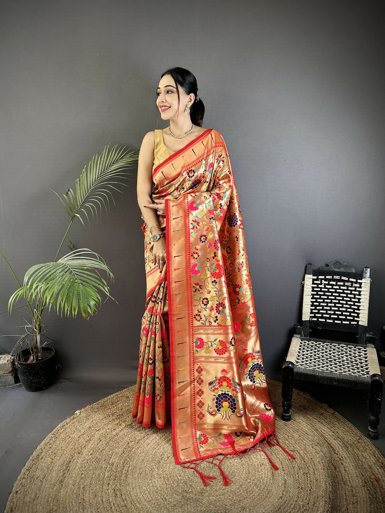 Crimson Red soft silk Paithani saree with intricate floral and leaf pattern