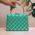 Elegant green Gota Patti fabric clutch for women featuring traditional decorative embroidery.