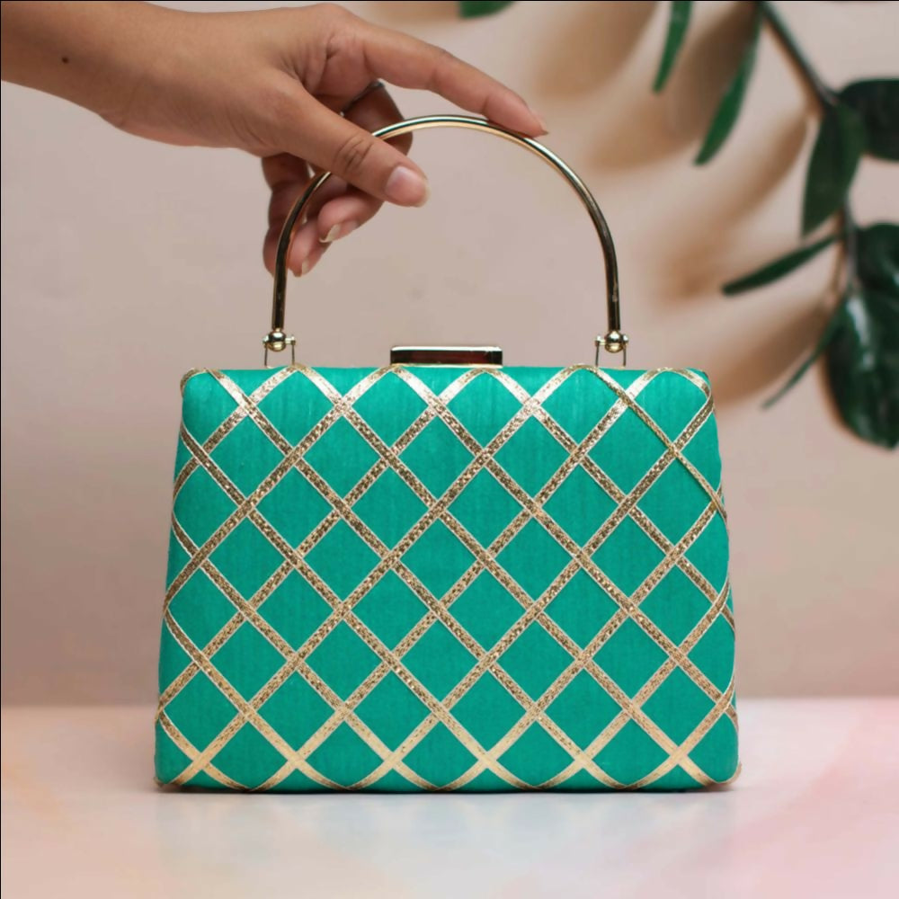 Elegant green Gota Patti fabric clutch for women featuring traditional decorative embroidery.