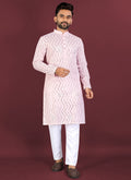Front view of a baby pink silk kurta with cross pattern white thread embroidery and silver sequence details