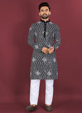 Black soft silk A-line kurta with white thread embroidery and silver sequence detail