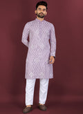 Lavender soft silk A-line kurta with white thread cross-pattern embroidery and silver sequins
