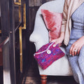 Handmade crochet clutch made from vibrant handspun sari silk yarn