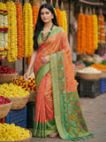 Traditional orange Pochampally silk saree with geometric patterns