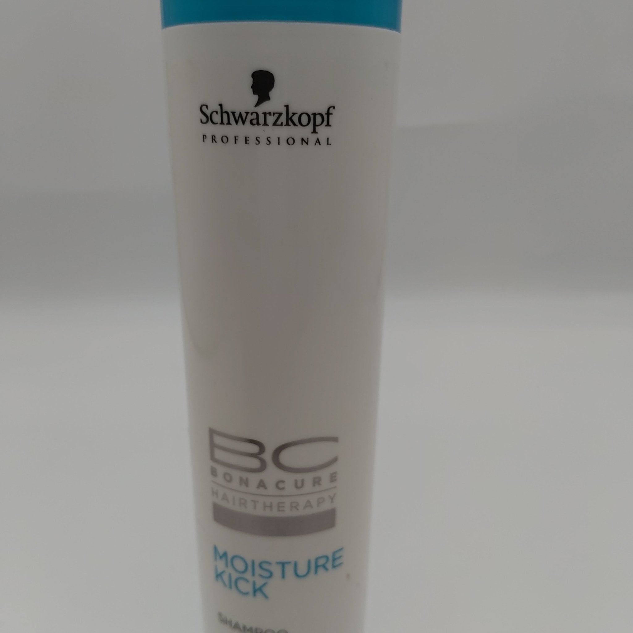 Bottle of Schwarzkopf Bonacure Moisture Kick Shampoo for hydration and revitalization