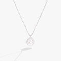 Scorpio zodiac pendant necklace with double-sided engraving and crystal accents.