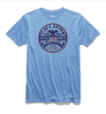 Men's vintage-inspired heathered blue crew neck t-shirt with navy and rust red graphic print.