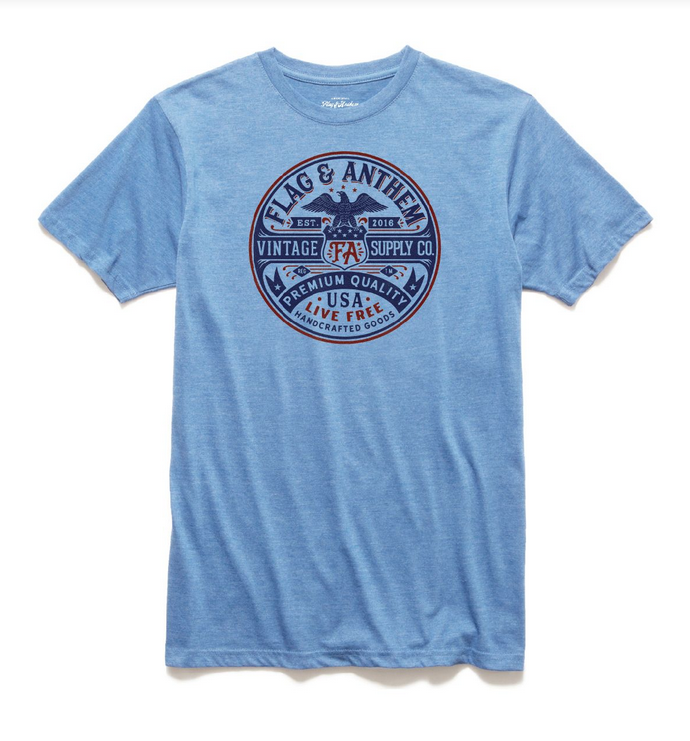 Men's vintage-inspired heathered blue crew neck t-shirt with navy and rust red graphic print.