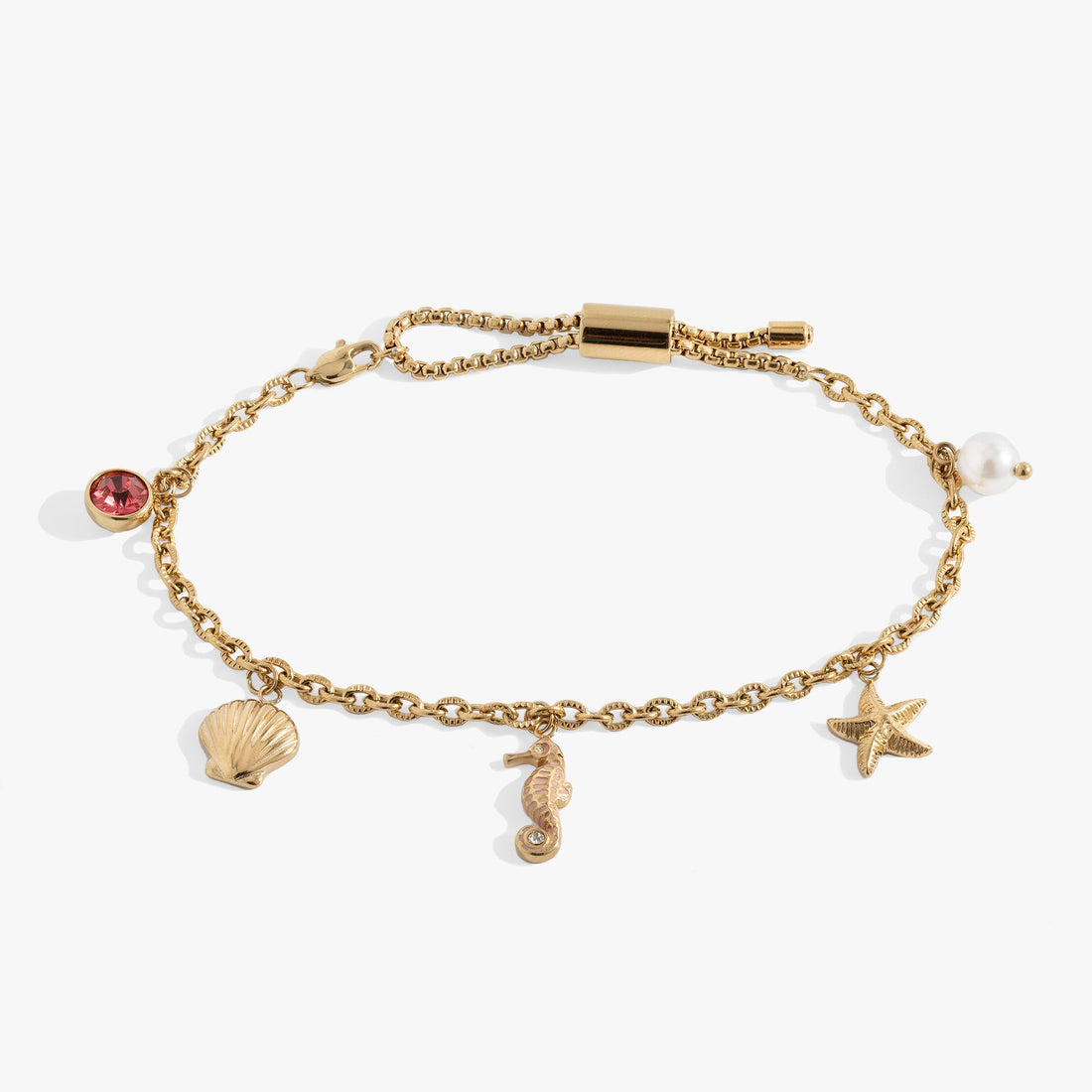 Seaside Anklet featuring seashell, blue and pink enamel seahorse, starfish, and pearl charms on a stainless steel chain.