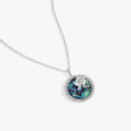 Blue abalone pendant necklace featuring a three-dimensional crystal-encrusted sea turtle.
