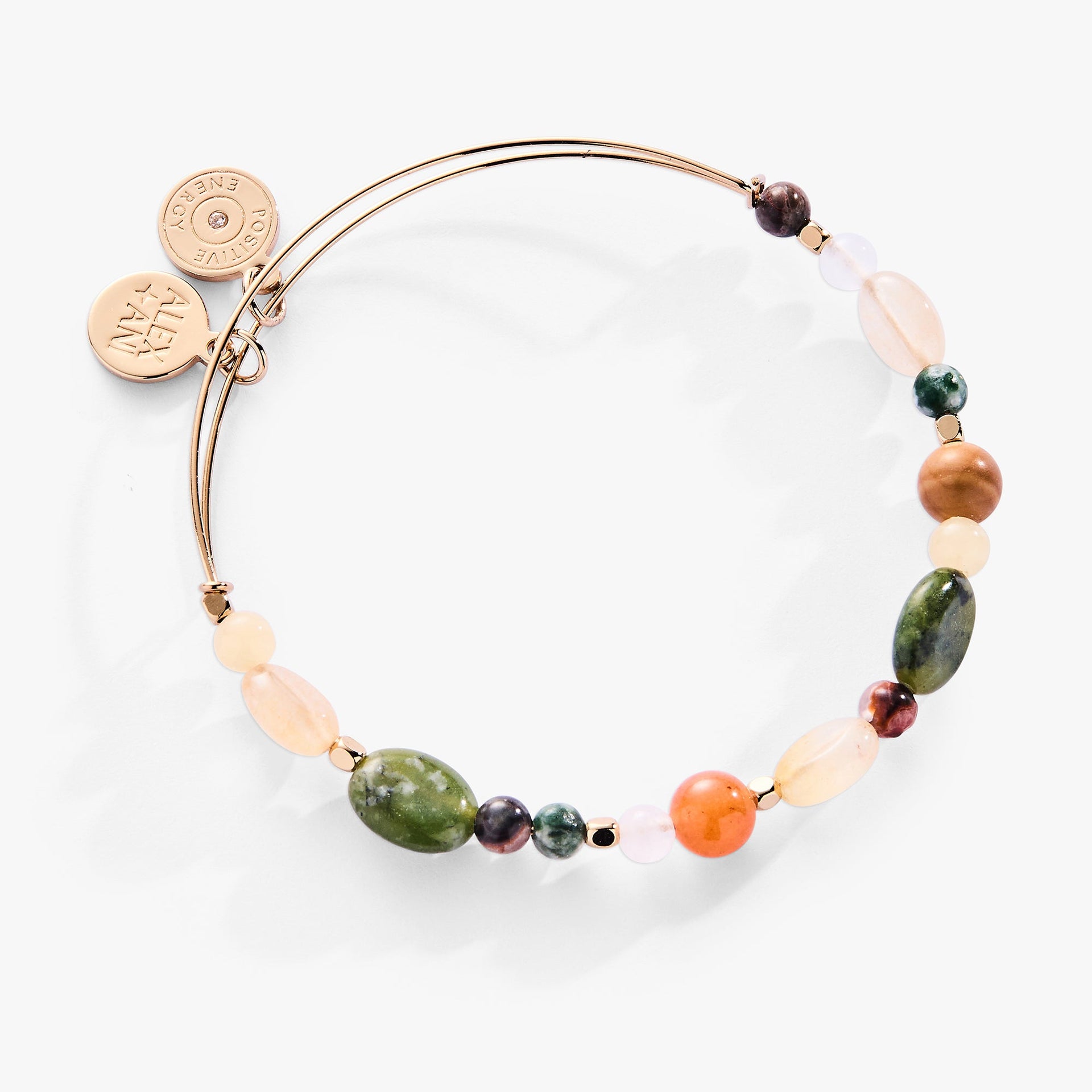 A multi-stone nugget gemstone bangle bracelet featuring Red Aventurine, Jasper, and Qing Hai Jade beads.
