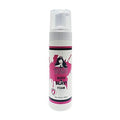 7 oz bottle of She Is Bomb Slick & Slay Foam styling mousse