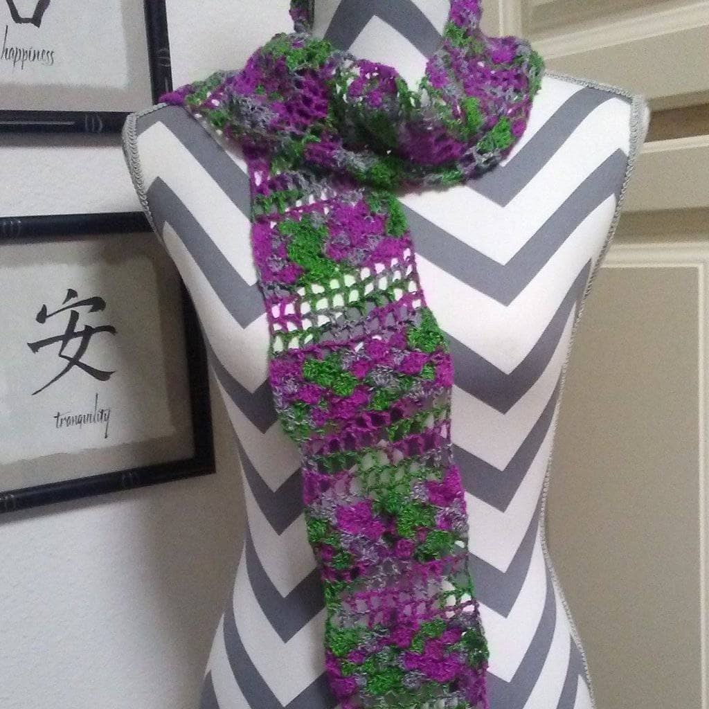 Crochet kit for a silk scarf in a vibrant lime green, turquoise, and deep violet gradient pattern